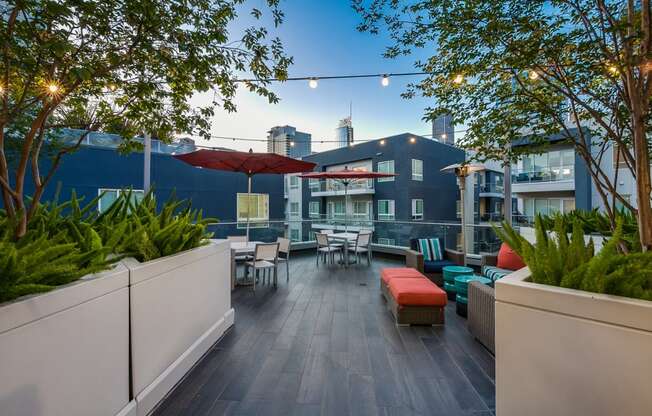 Rooftop Deck with Lounge and Dining Area at Windsor at West University, Houston, Texas