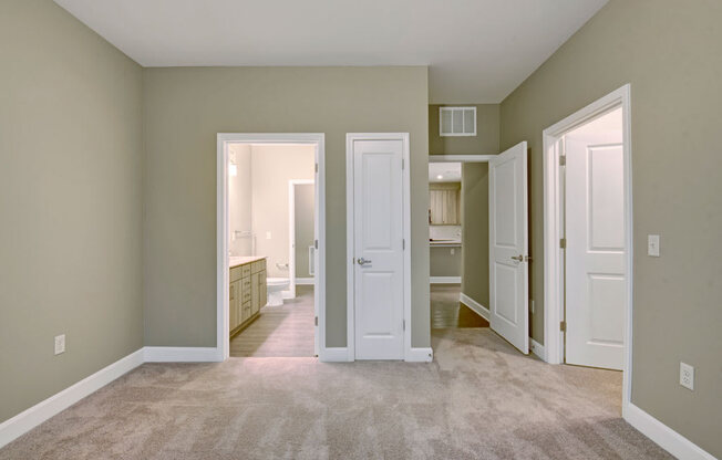Spacious bedroom with connected bathroom and closet. at York Woods at Lake Murray Apartment Homes, Columbia, 29212