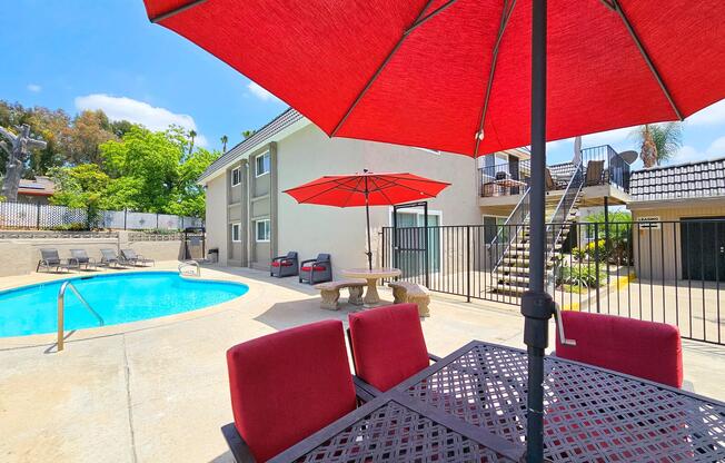 a couple of lawn chairs sitting on top of a table