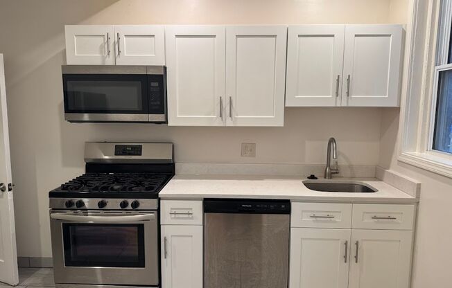 Great Morningside Row House with Front Porch!