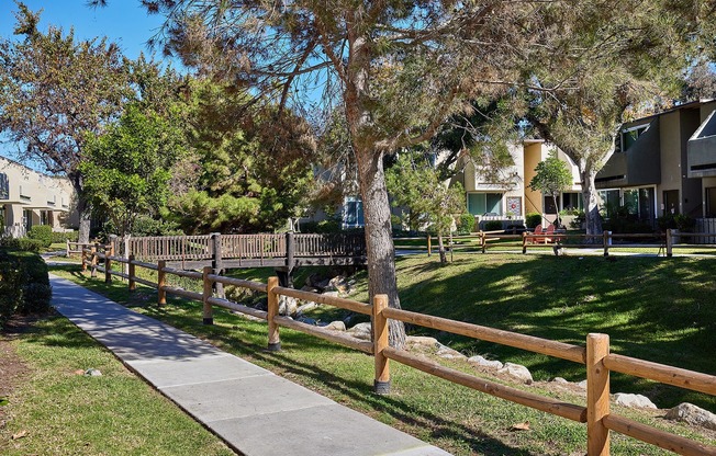 Community green spaces and creek with new fencing