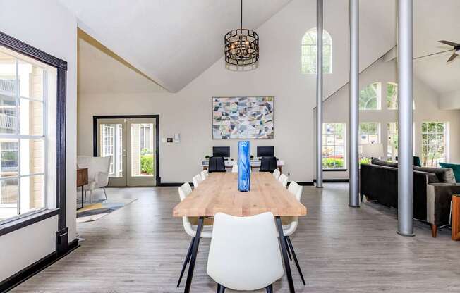 the dining room is open to the living room and kitchen at The Davis Apartments, Alabama  