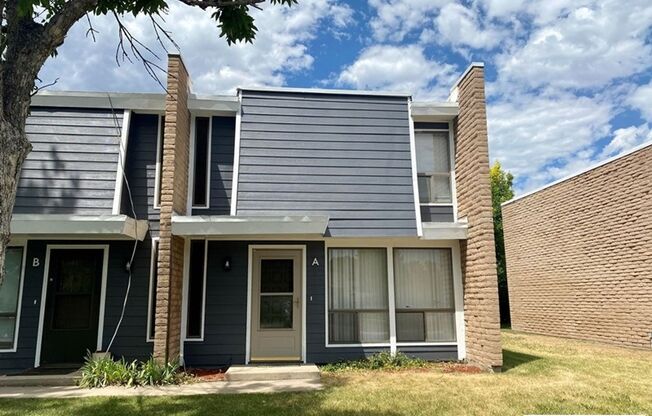 Charming Brick Two-Story Townhouse with Patio