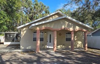 Spacious 3-Bedroom, 2-Bath Home with Covered Screened Porch & Large Kitchen in Tampa