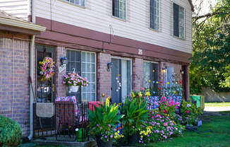 Apartment home with flower decorations, at Farmbrooke Manor