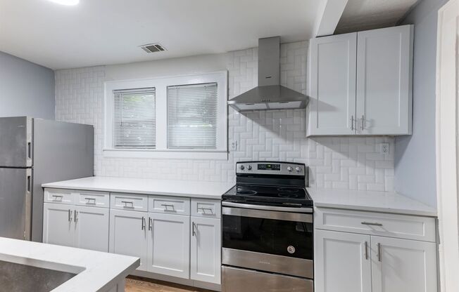 Dive into City Living: Spacious 4 Bed/2.5 Bath Home!