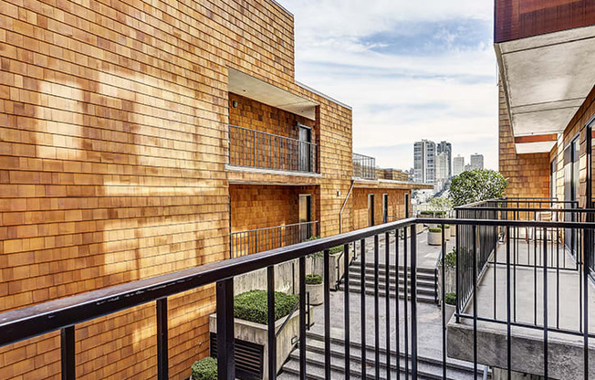 a balcony with a view of the city