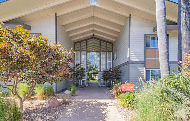 A house with a sign that says