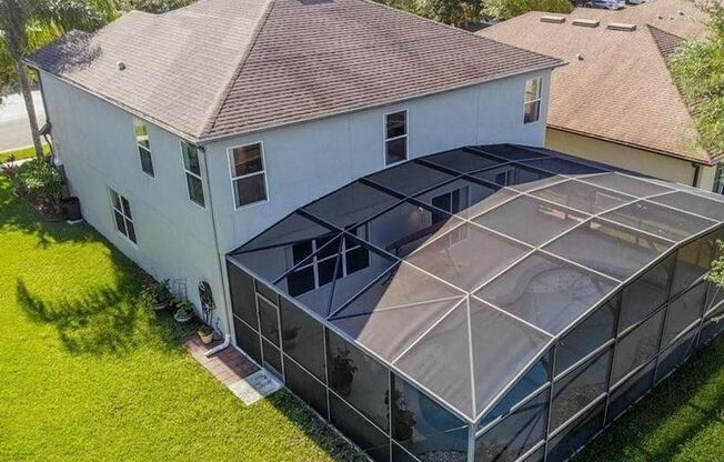 Gorgeous waterfront 4 beds 2 and half baths  home in highly desirable Eagle Creek Community in the heart of Lake Nona.