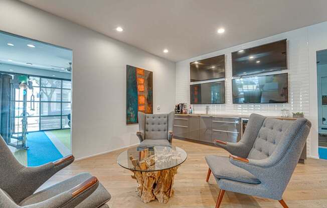 Contemporary living room with wet bar at Vue Live Oak Apartments, Dallas, Texas
