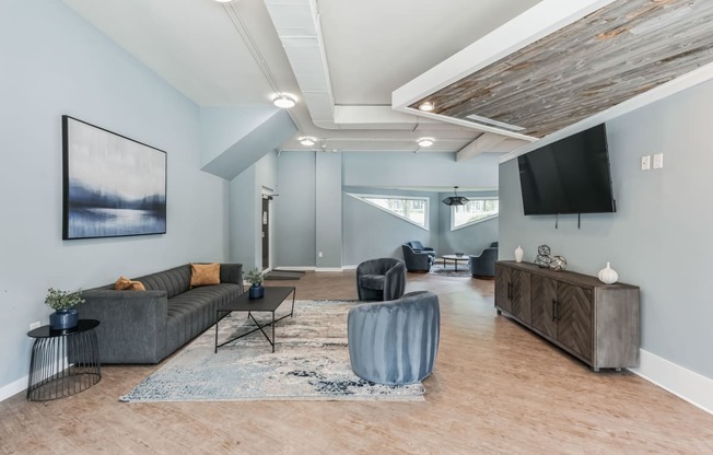 a living room with a couch and a tv