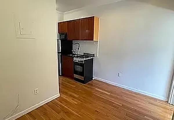 235 E 27 ST