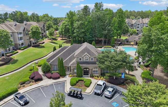 Birds eye view of the community and a pool.