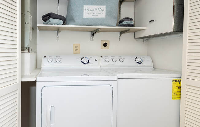 a washer and dryer are located in the laundry room at Chapel Valley Townhomes, Baltimore, MD 21236