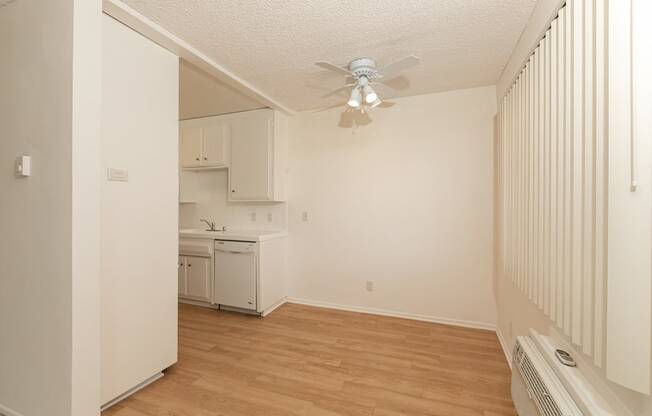 Dining Room with Hardwood Floors and Fan