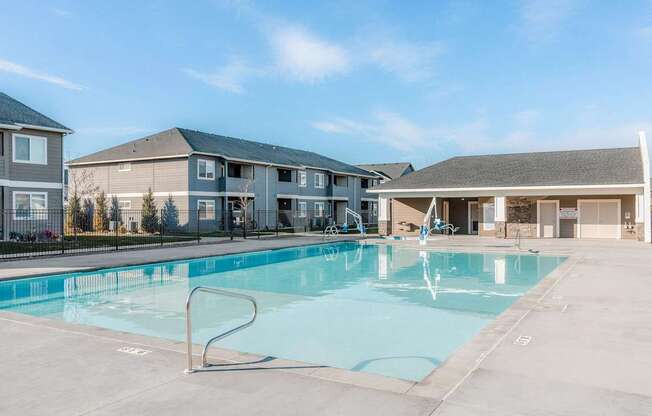 the preserve at ballantyne commons swimming pool with apartment buildings