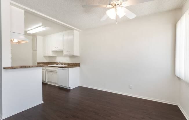 Dining Room with Hardwood Floors and Fan