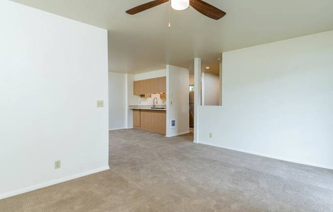 Spacious Living and Dining area with ceiling fan