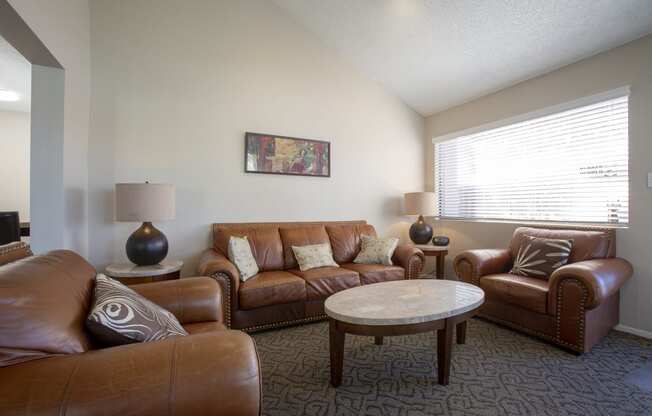 a living room with couches and a coffee table