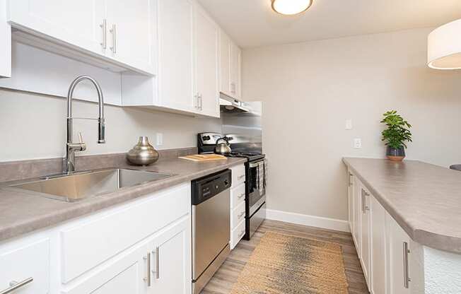 Pleasant Hill CA Apartments - Ellinwood - Modern Kitchen with Wood-Style Flooring