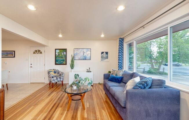 Mid-Century Charm Meets Modern Comfort | 4BR Aurora Home with Finished Basement