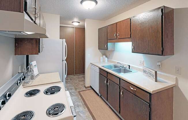 kitchen with dishwasher at pointe west apartments