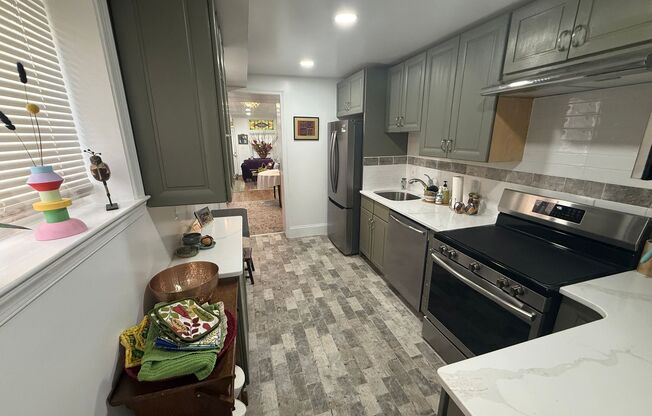 Fully Furnished & Elegantly Renovated Historic 3BR/2.5BA Home with Private Yard & Deck!