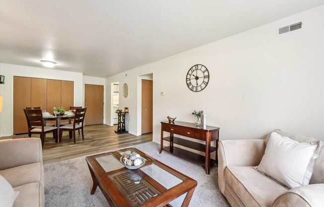 Bright and airy living room with natural light at Eastwood Village Apartments in Clinton Township, MI