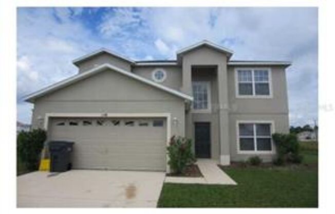4 bedroom,  2.5 Baths located at 1348 Nelson Park Ct Poinciana, FL 34759.