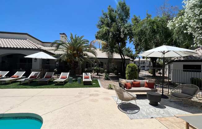 Revamped poolside loungers, adding a touch of excitement to your leisure time at Boulders at Lookout Mountain Apartment Homes, Phoenix, 85022