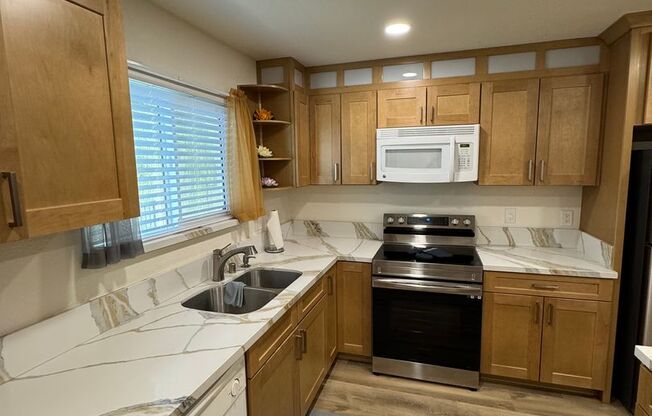 Beautifully Renovated 2 Bedroom Condo - Partially Furnished