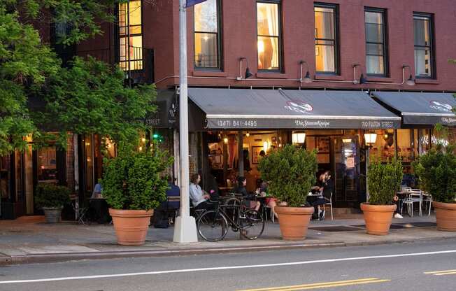 a street view of a restaurant on a city street at The Paxton, Brooklyn, NY 11201