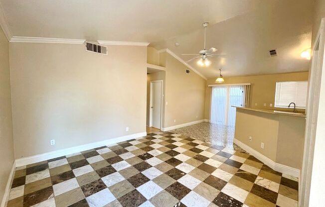 A SPACIOUS SINGLE STORY WITH TILE FLOORING, 3 BEDROOM & 2 BATH HOME LOCATED NEAR THE NELLIS AIR FORCE BASE WITH NEARBY SHOPPING CENTERS AND FAMILY PARK. MINUTES AWAY FROM THE I-15 FREEWAY!