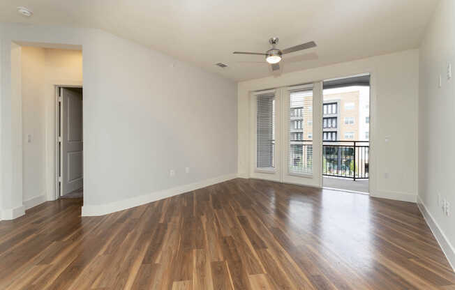 Living Room with Balcony and Hard Surface Flooring