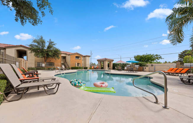 Swimming Pool With Relaxing Sundecks at The Colony Apartments, Casa Grande, 85122