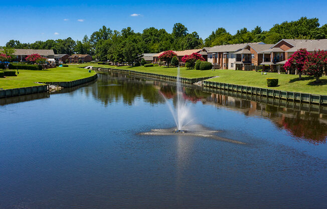 Canal and fountain at Holly Point Apartments