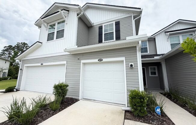 Welcome to this beautiful townhome for rent in the highly desirable Wells Creek community!