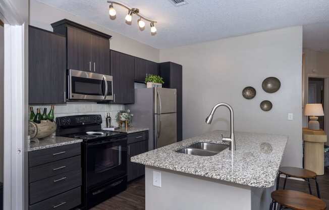 modern kitchen at Seasons at Umstead apartments in Raleigh