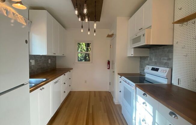 Perry District Gem – Move-In Ready 3 plus Bed / 2 Bath Brick Home with Finished Basement & 2-Car Garage