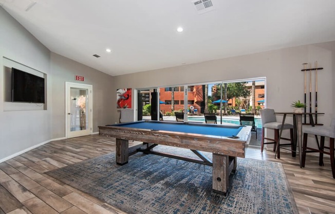 Community game room with pool table at Saratoga Ridge, Phoenix, Arizona