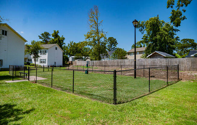 Fenced-in Bark Park at Deerbrook Apartment Homes in Wilmington, NC 28405