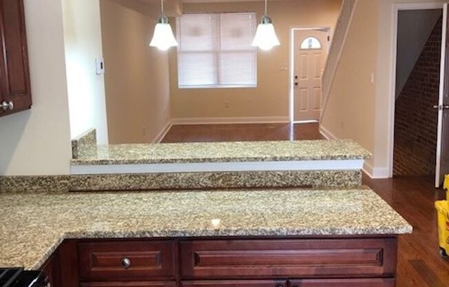 2-Bedroom Townhome with Finished Basement + Covered Front Porch & Parking