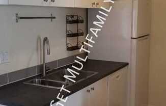 1105 AND 1111 E BUTLER DR