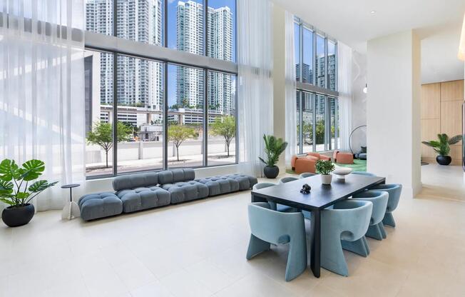 Expansive windows and chic seating make Modera Riverside’s lobby lounge a welcoming retreat in downtown Miami.