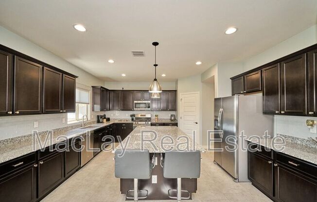 2415 E RUNAWAY BAY PL