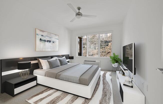 Bedroom With Ceiling Fan at Infinity Edgewater, Edgewater