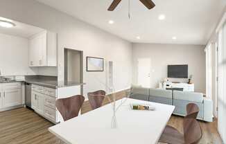 a living room with a kitchen and a dining table