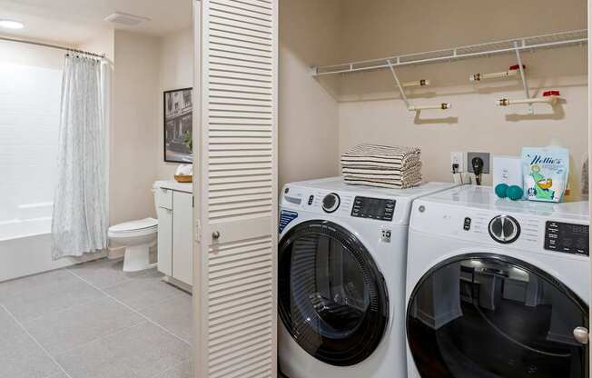 A laundry room with a washer and dryer.