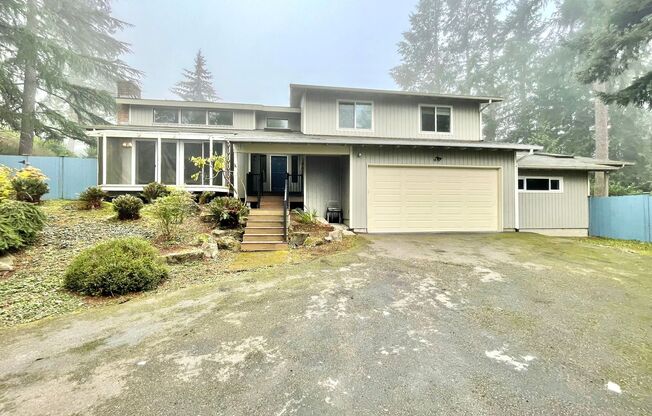 Spacious Tri-Level Home in West Lake Sammamish with Luxurious Features and Prime Location