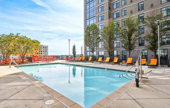 the swimming pool and deck chairs